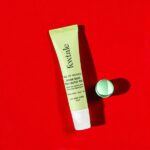 Foxtale 2% Salicylic Acid Acne Spot Corrector Gel in a 15ml orange tube, formulated to target and reduce acne spots, unclog pores, and soothe inflamed skin.